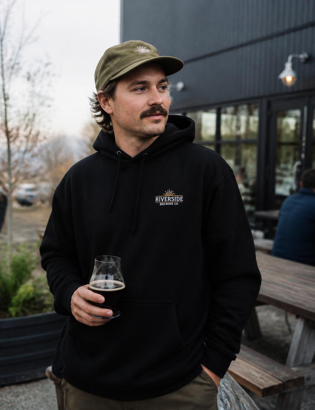 Person wearing Riverside Brewing Co. hoodie